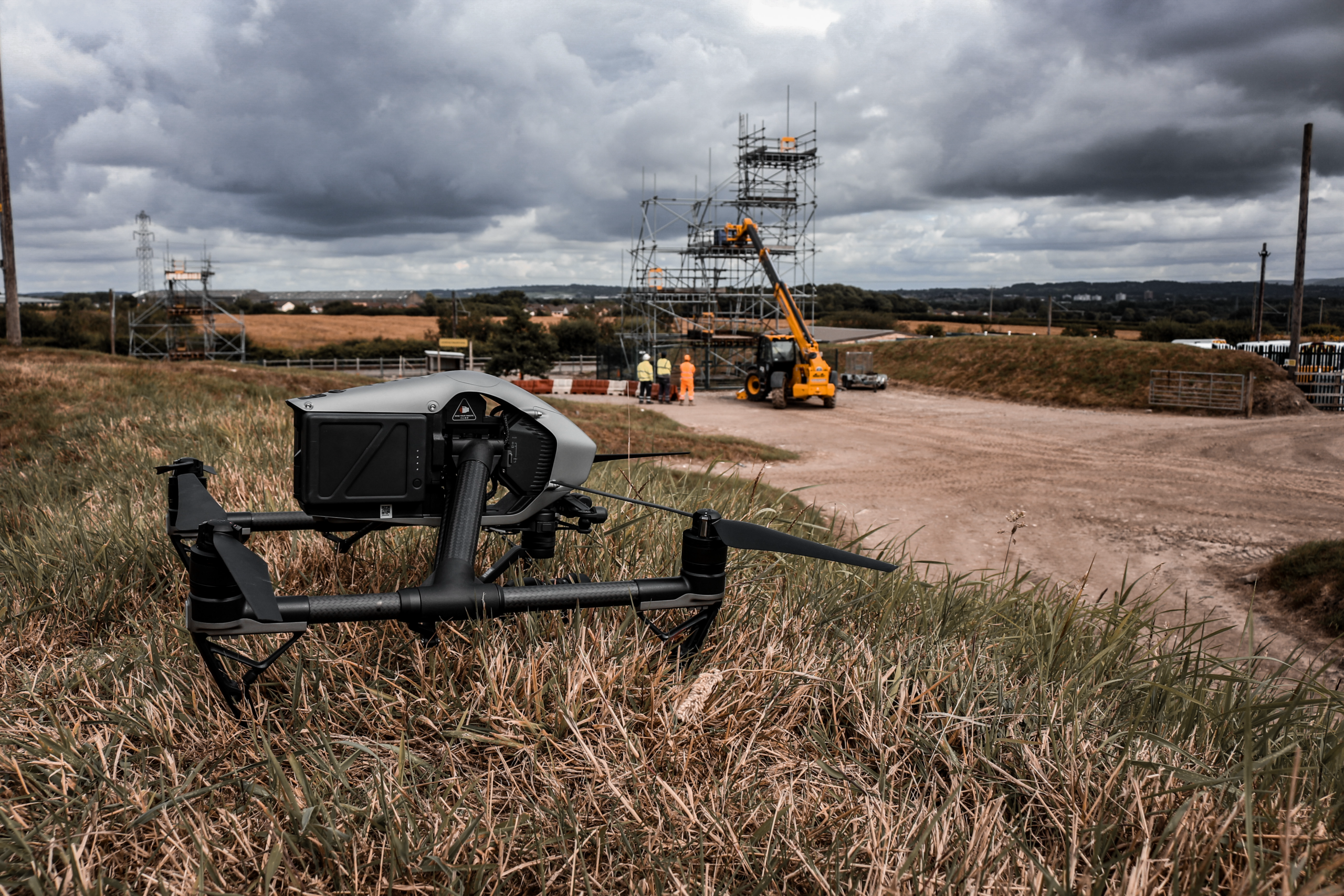 a drone on a field filming to improve website seo videos